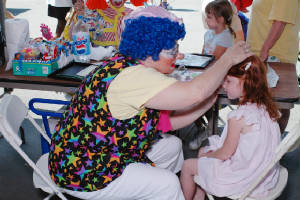 Boots the clown face painting in Saratoga Springs