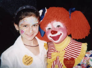 La-De-Dah the clown, posing for picture with child